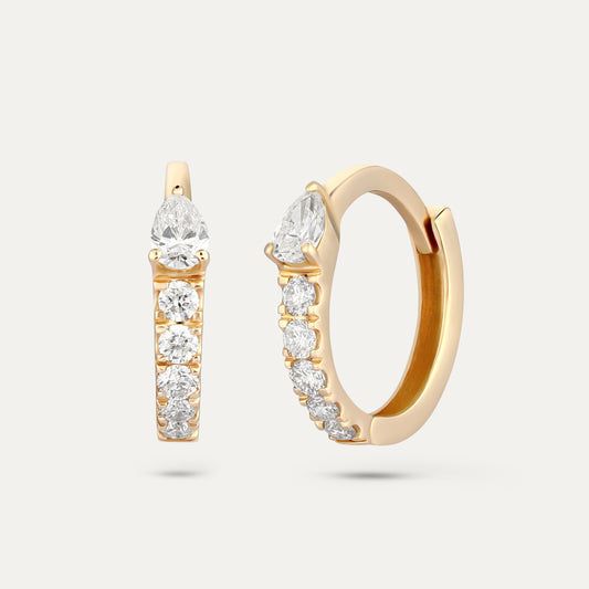 Gold hoop earrings with embedded diamonds on a white background